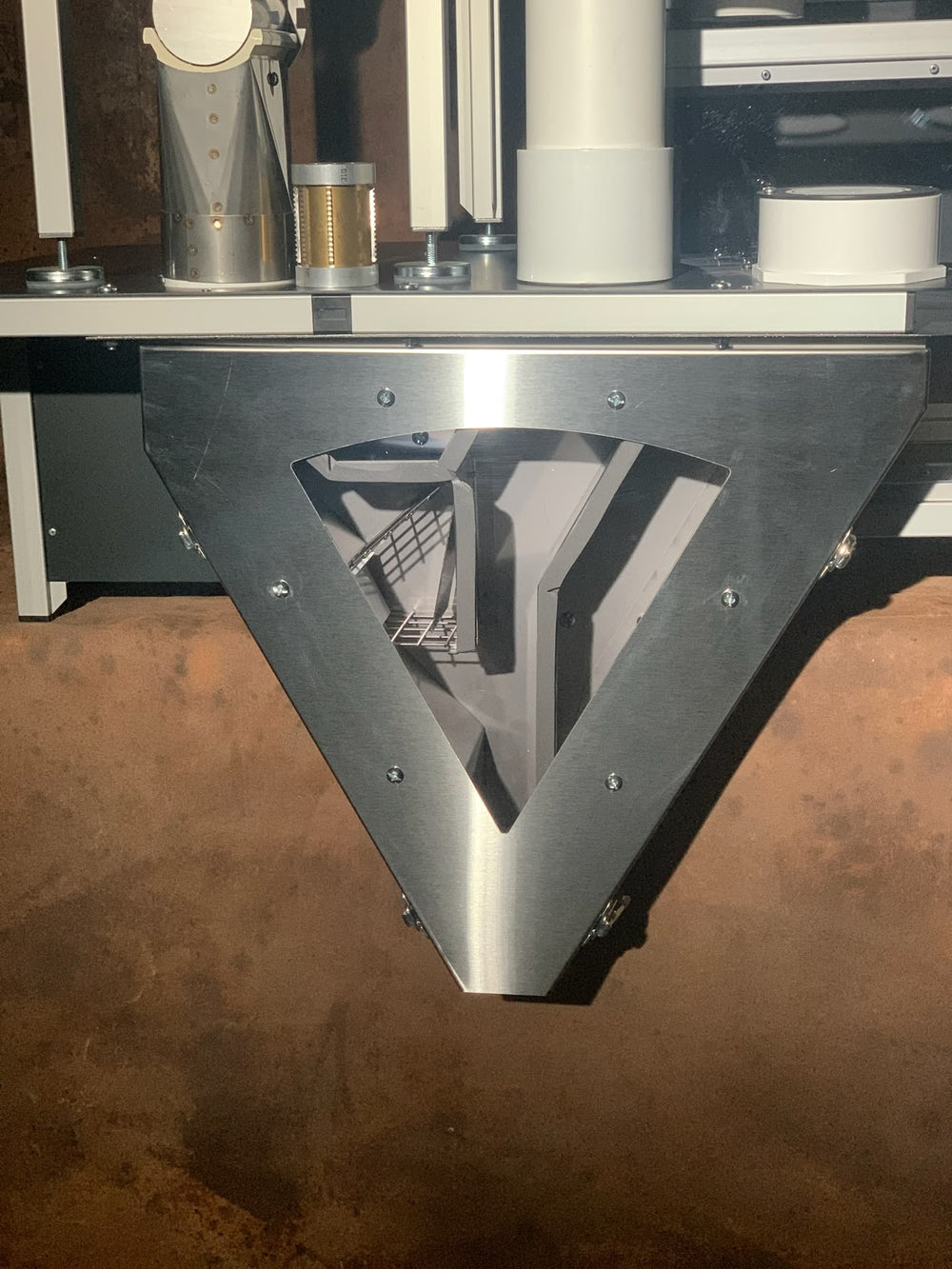 Close view of the Flux stainless steel chamber and clear triangular viewing window